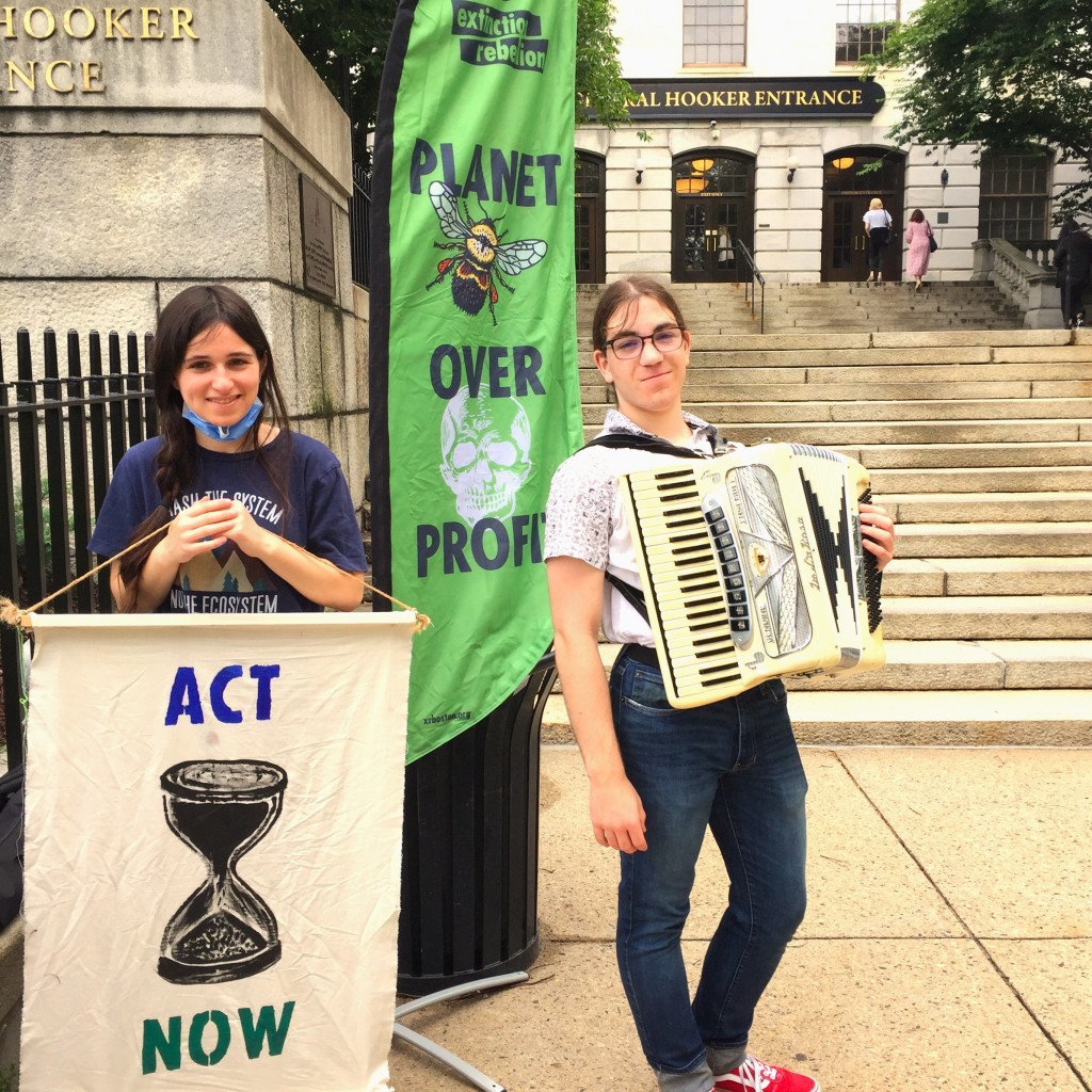 June 27th: XR Youth leaders captivate onlookers with an accordion performance of ‘Sing for the Climate’